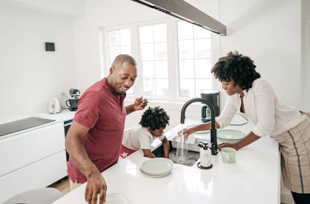 istock Brazilian family  having fun in the kitchen 1194573295