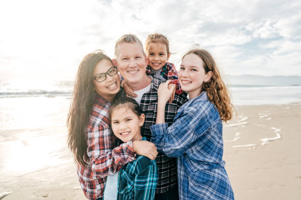 istock Family on the beach 1194573311