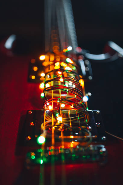 istock electric guitar with festive Christmas lights 1194573335