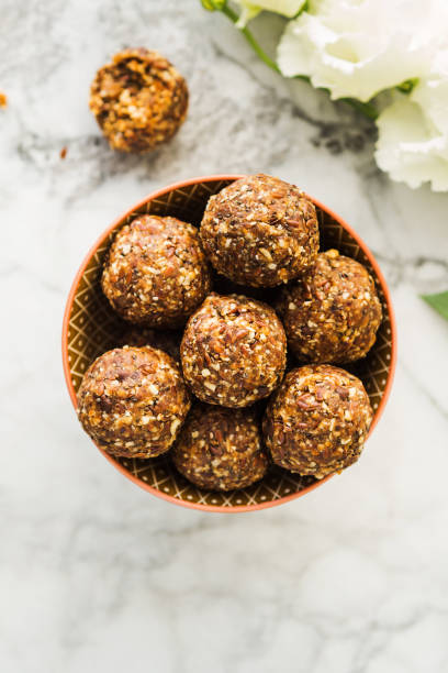 istock Energy balls with healthy ingredients on marble 1194573342