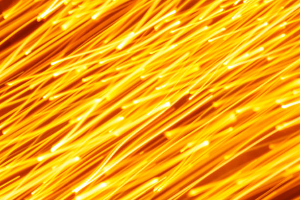 istock Futuristic blurred lights holiday monochrome background in yellow 1194573347