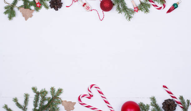 istock Spruce branches, Christmas balls, candy on white background, preparing for the New year. top view, copy spase 1194573850