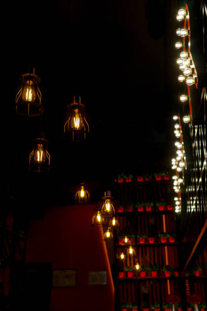 istock Minimalistic lamps in loft style. Yellow light. 1194576667