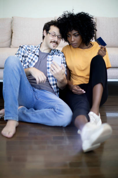 istock Young couple shopping online 1194580194
