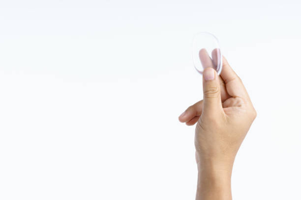 istock Hand holding transparent cosmetic silicone puff 1194582559