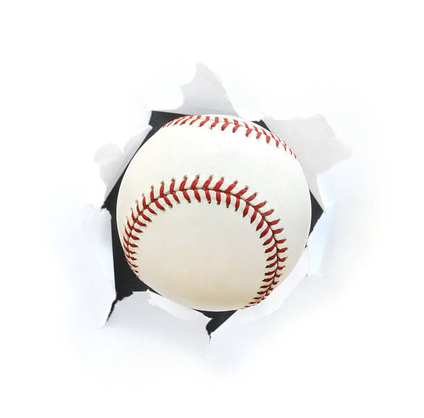 istock A picture of a baseball bursting through a hole 119458727