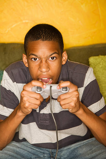 teenage boy playing computer games