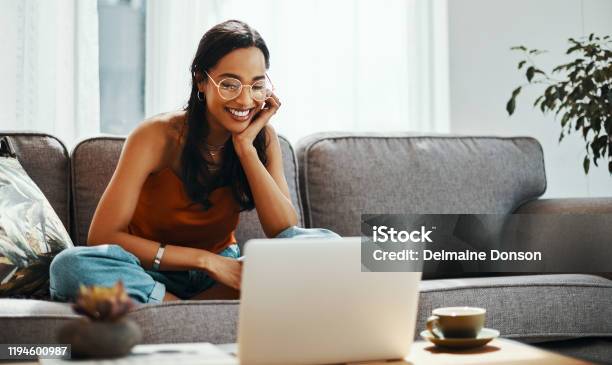 Sofa Time Is For Movie Marathons Stock Photo - Download Image Now - Laptop, Women, One Woman Only