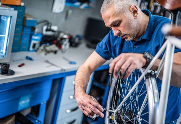 istock Bicycle technician repairing bicycle transmission. 1194604454