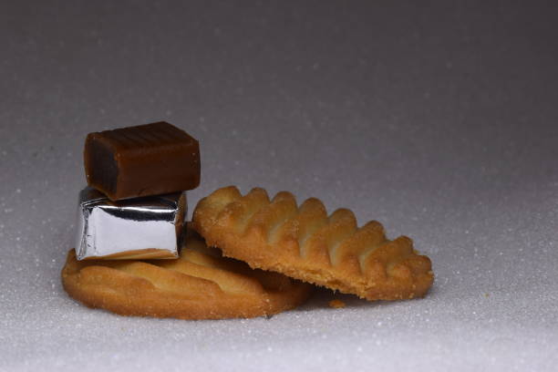 istock close up cookie and chocolate bar with white background 1194607363