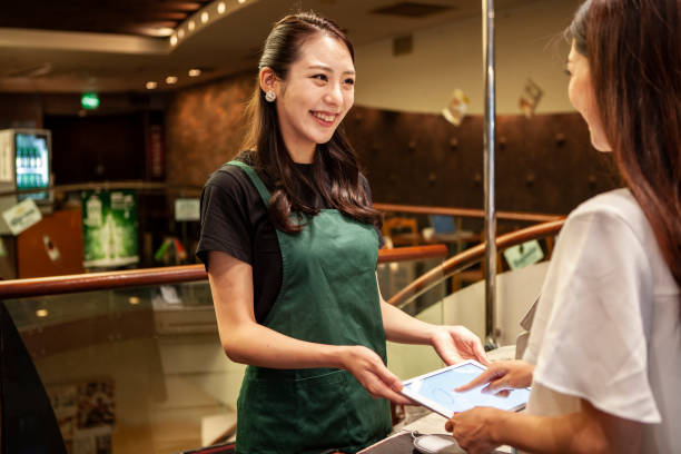 istock Female staff accounting at restaurant 1194616063