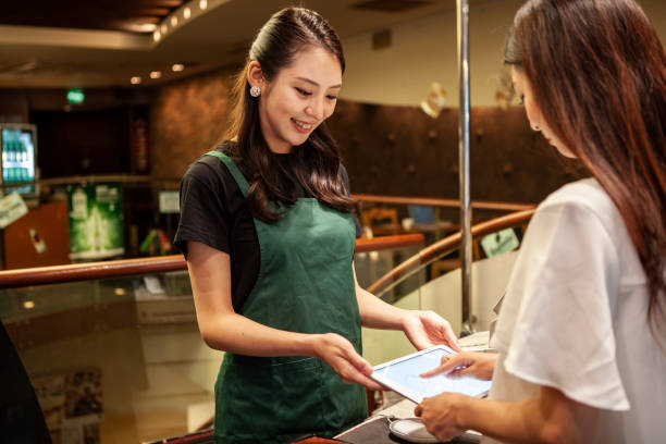 istock Female staff accounting at restaurant 1194616076