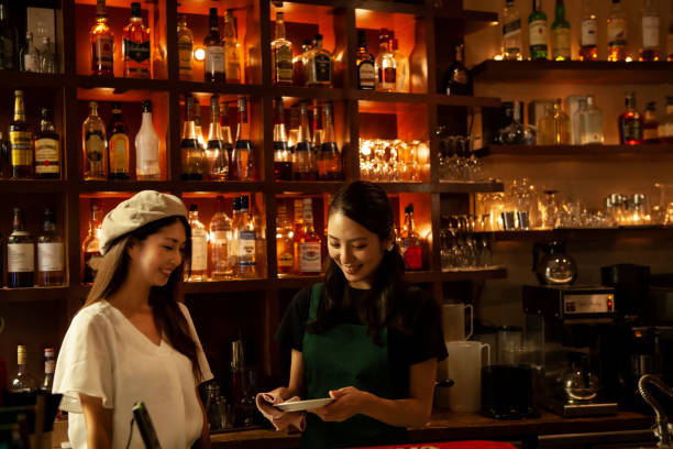 female staff serving drinks at cafe and bar - espresso women cup drink imagens e fotografias de stock