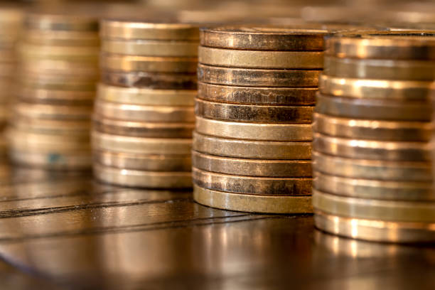 istock Piles of coins 1194621569
