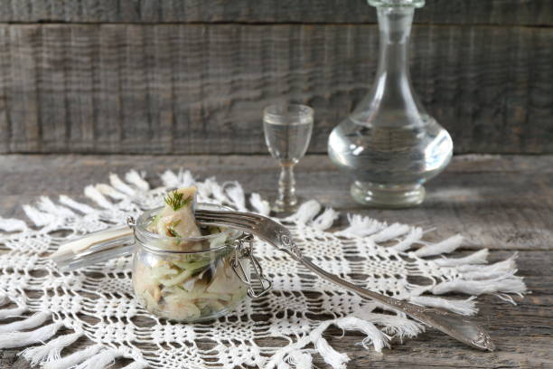 istock Jar of salted herring and vodka. 1194622085