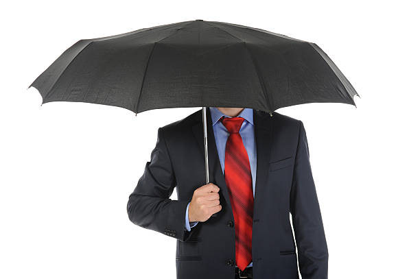 istock Image of a businessman with umbrella 119462865