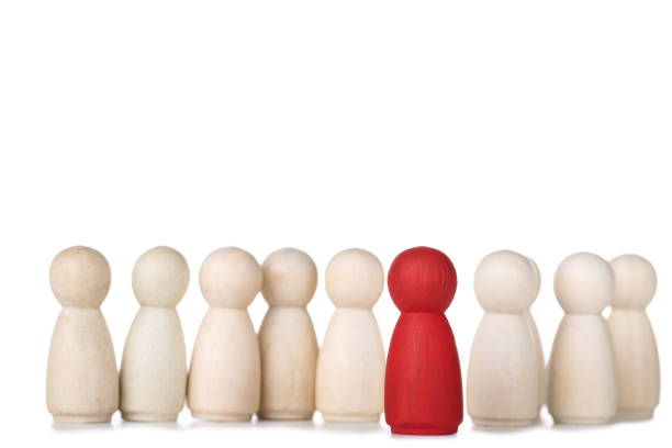istock Leader concept. Wooden figures on white background 1194629241