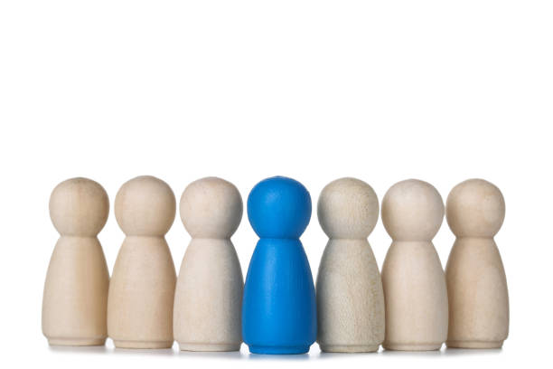 istock Leader concept. Wooden figures on white background 1194629329