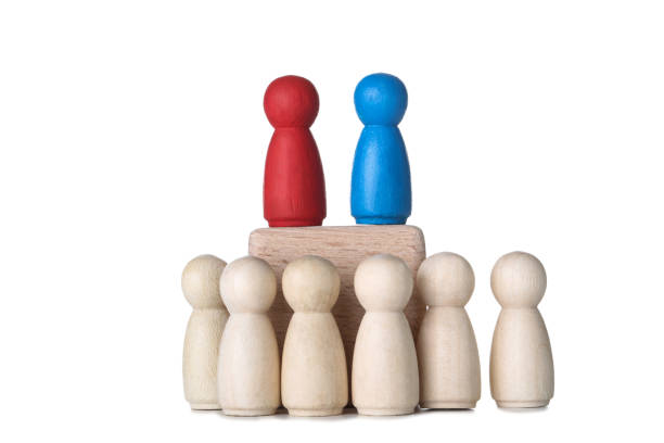 istock Leader concept. Wooden figures on white background 1194629502