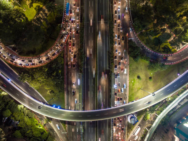 istock Traffic Jam during rush hour in Semanggi interchange overpass in the night time. 1194630312