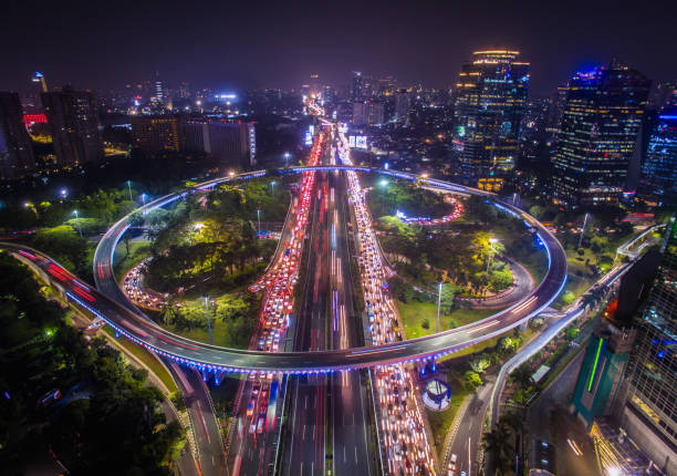 istock Traffic Jam during rush hour in Semanggi interchange overpass in the night time. 1194630313