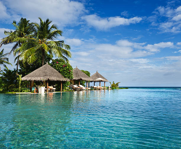 istock swimming pool in beach resorts 119463085