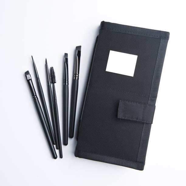 istock Set of black eyebrow brushes. Leather case with makeup brushes. 1194637793