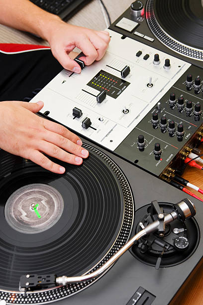 istock Hip-hop DJ scratching the vinyl record 119464000