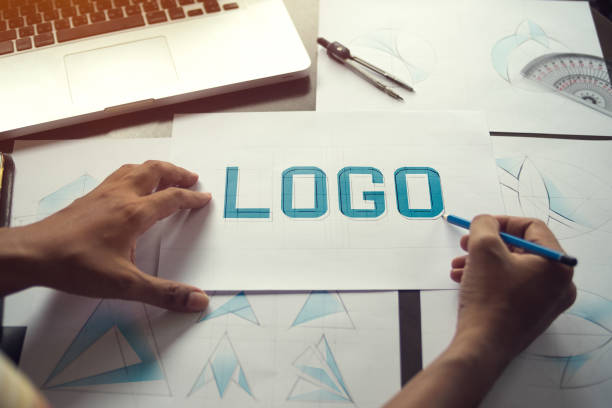 istock Graphic designer creative design sketch drawing logo Trademark brand Workspace 1194641541