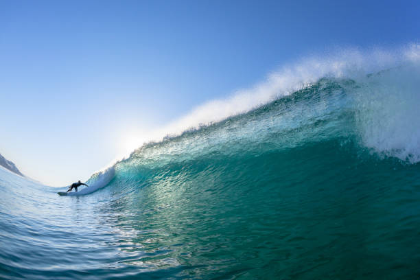 istock Surfing Surfer Bottom Wave Ride Rear Behing Water Photo 1194641758