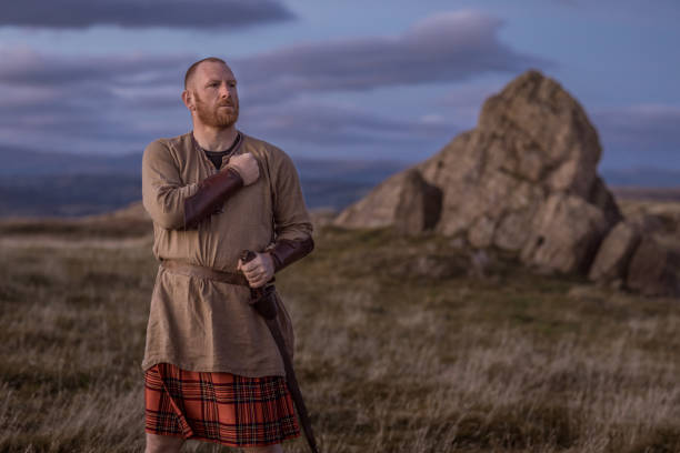 istock Scottish Redhead Warrior wearing a kilt 1194643622