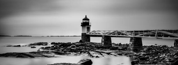 istock Panoramic black and white winter image of the Marshall point Lighthouse 1194643660