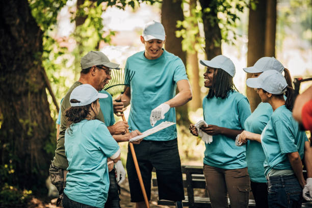 istock Group of volunteers talking 1194643893