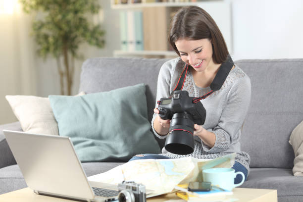 istock Happy tourist setting dslr camera planning vacation 1194646184