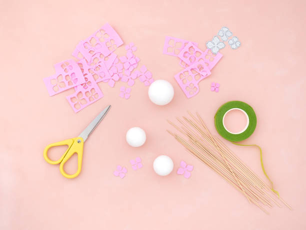 istock DIY instruction. Making flowers from foamiran. Craft tools and supplies. 1194647156