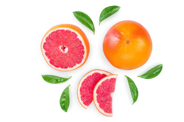 istock Grapefruit and slices with leaves isolated on white background. Top view. Flat lay 1194647490