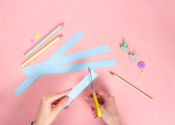 istock Scrapbooking master class. Diy. Make a Valentines day card whith paper hearts. Women's hobby. Craft supplies on the table. 1194647861