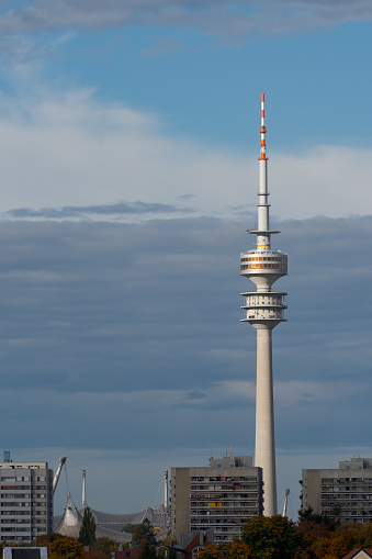 Olympic tower in Munich before cloudy sky