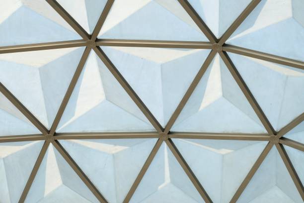 istock Close up a triangle pattern of a glass house rooftop 1194648723