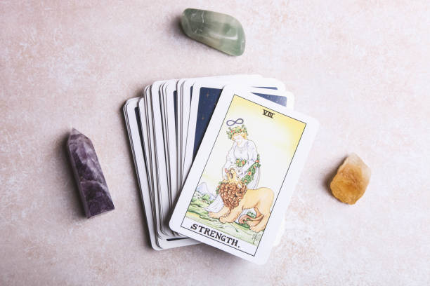 istock Fortune-telling tarot cards and mineral stones 1194648822
