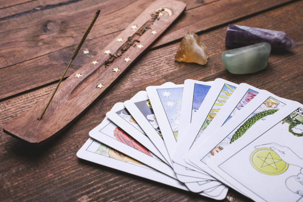 istock Fortune-telling tarot cards and mineral stones 1194648832