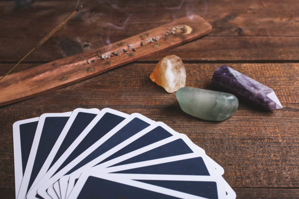istock Fortune-telling tarot cards and mineral stones 1194648833