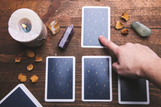 istock Fortune-telling tarot cards and mineral stones 1194648873