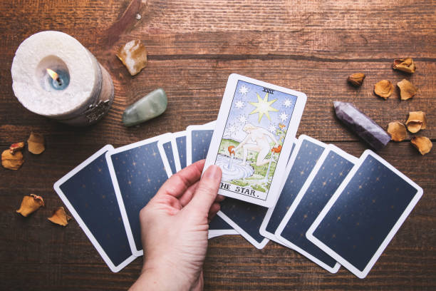 istock Fortune-telling tarot cards and mineral stones 1194648879