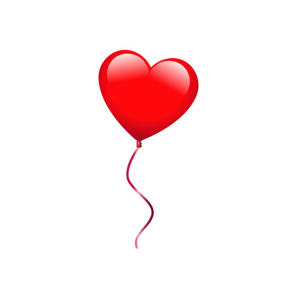 istock Red Heart Shaped Balloon with Yellow Ribbon 1194650696