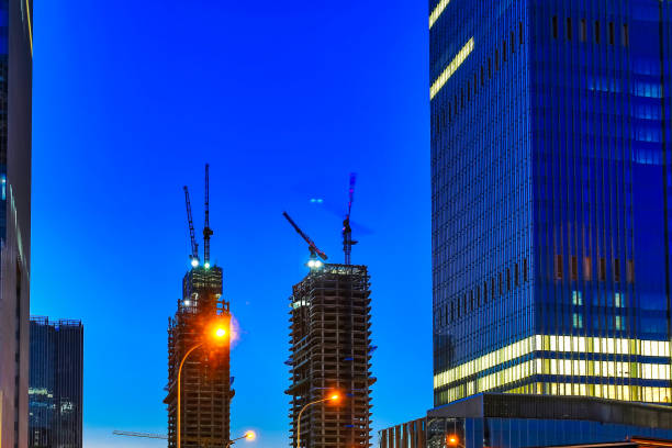 istock Tower crane in the night 1194657369