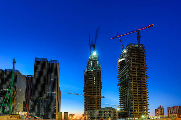 istock Tower crane in the night 1194657398