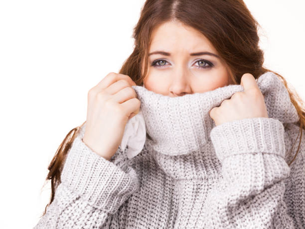 istock Woman feeling comfortable wearing soft sweater 1194658524