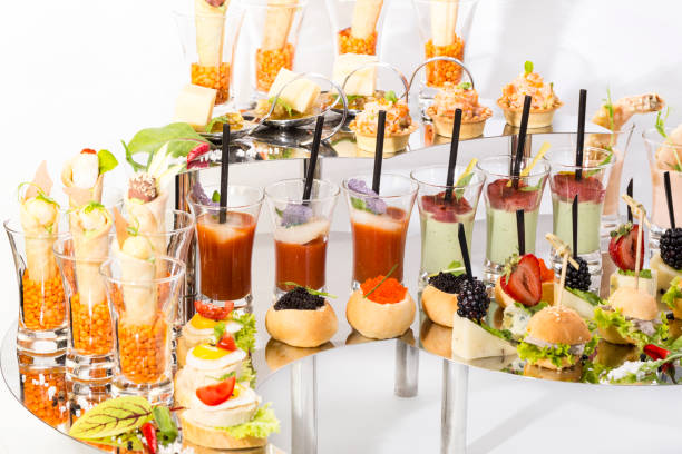 istock Snacks and canapes on the banquet table, closeup shot 1194659521