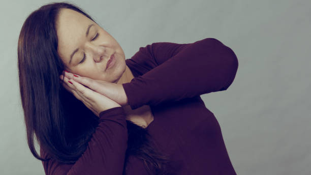 istock Woman being sleepy gesturing 1194659851